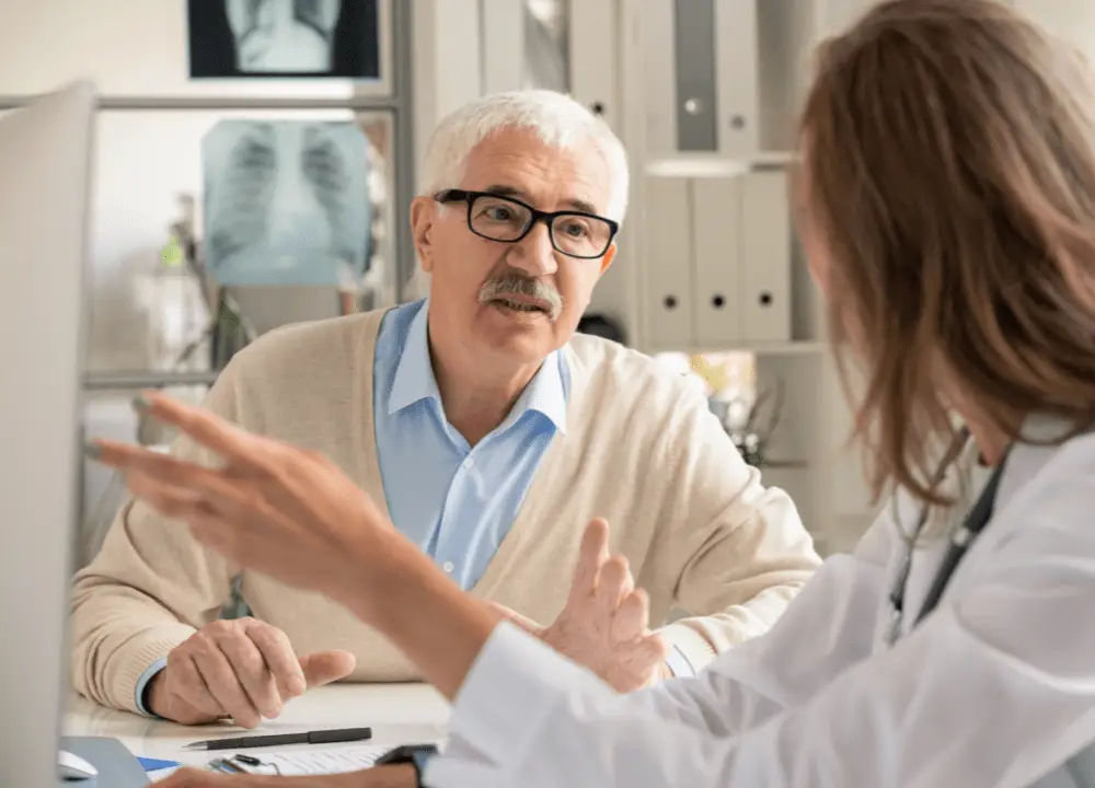 Doctor consulting with mesothelioma patient diagnosed from asbestos exposure