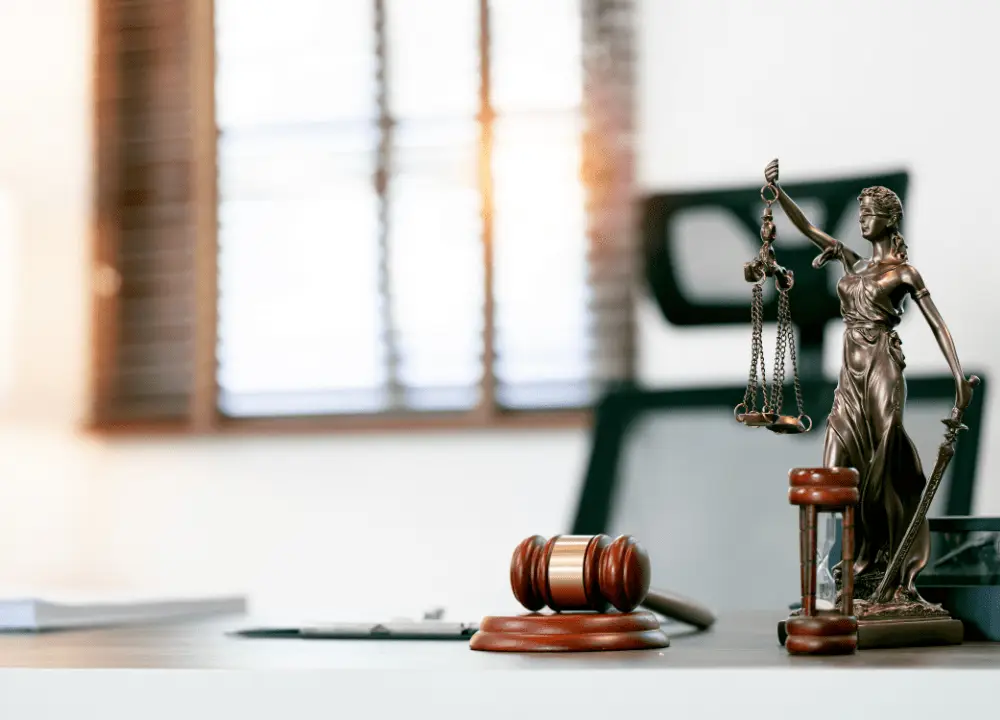 gavel, legal documents, and scales of justice representing asbestos litigation