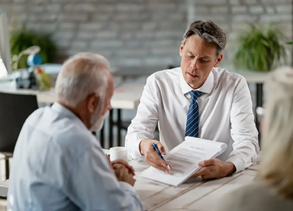 Beyond the Diagnosis: Understanding How Pleural and Peritoneal Mesothelioma Develop Differently 2 Attorney consulting a veteran about asbestos exposure and mesothelioma claims.