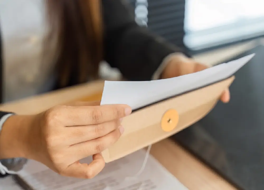 Attorney reviewing eligibility documents for asbestos trust fund claim