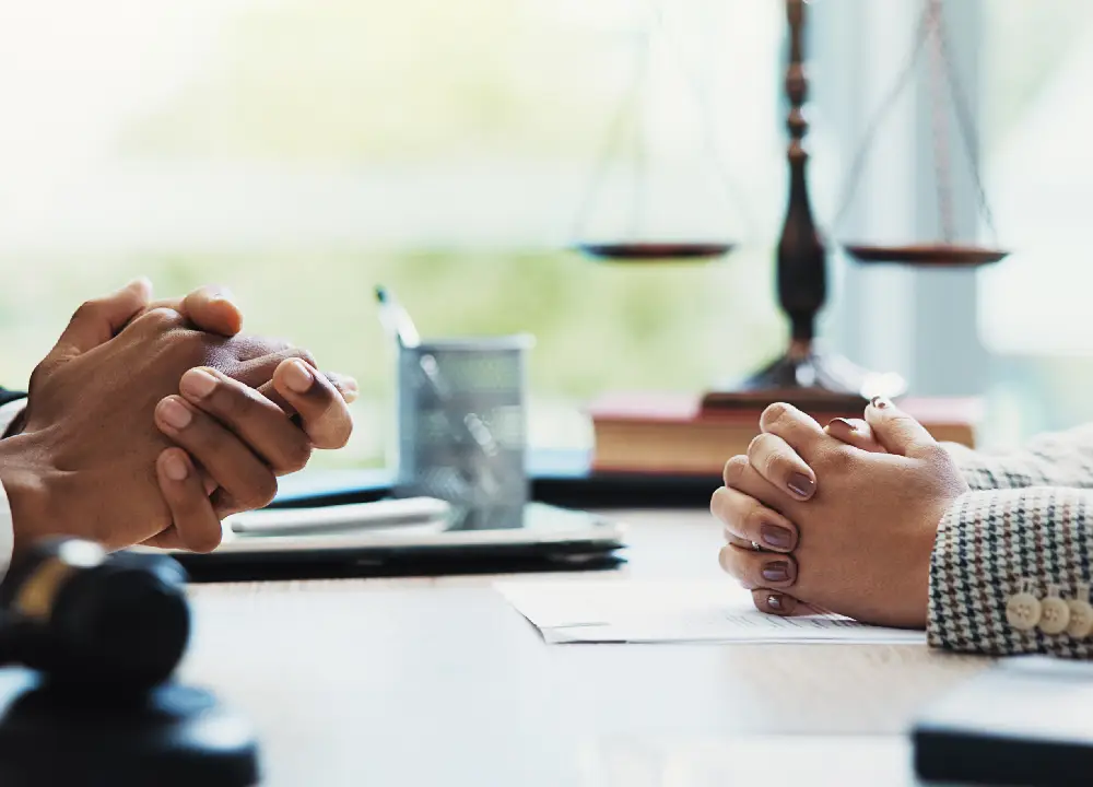 Corporate law consultation between business professionals and a legal advisor.