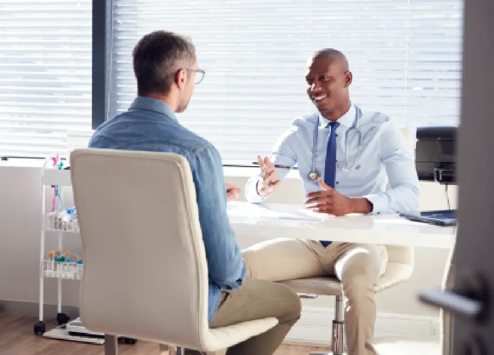 Mesothelioma 101: Symptoms, Causes, and Your Legal Options 2 Mature male patient consulting with a doctor about early diagnosis