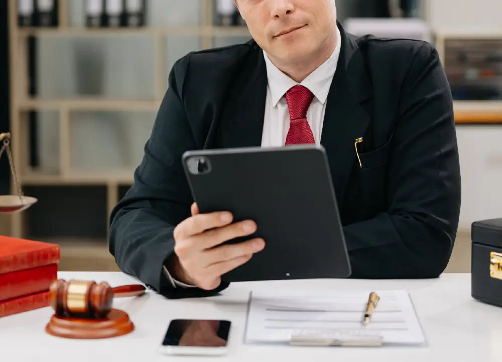 Understanding Mesothelioma Settlements: Your Path to Compensation 3 Experienced lawyer in a confident, established office setting.