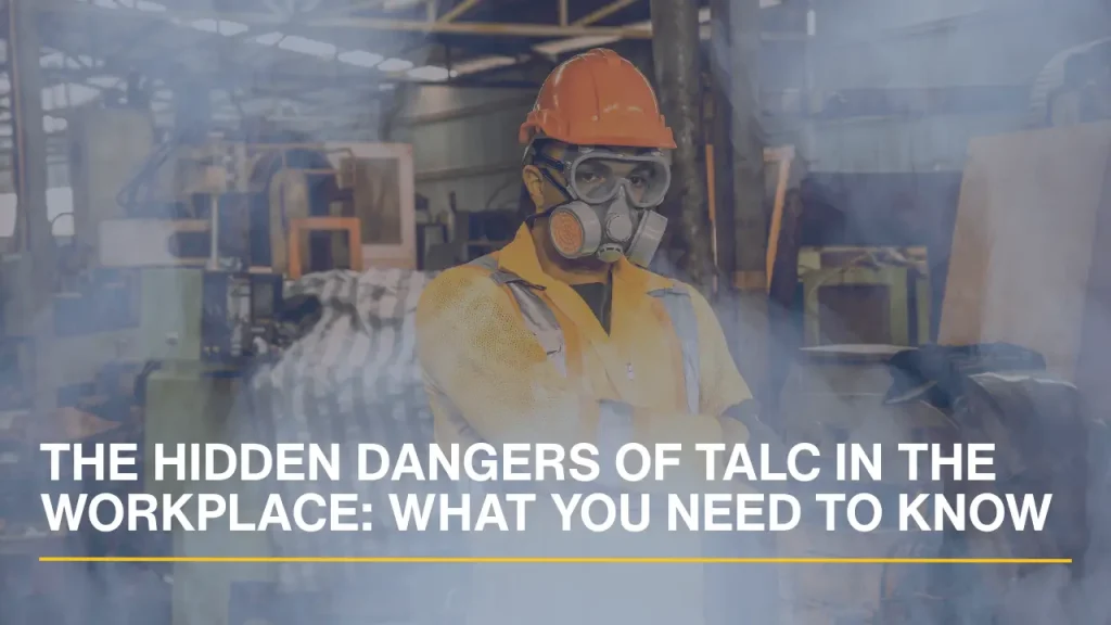An industrial worker in a factory setting surrounded by airborne talc dust, representing workplace exposure risks.