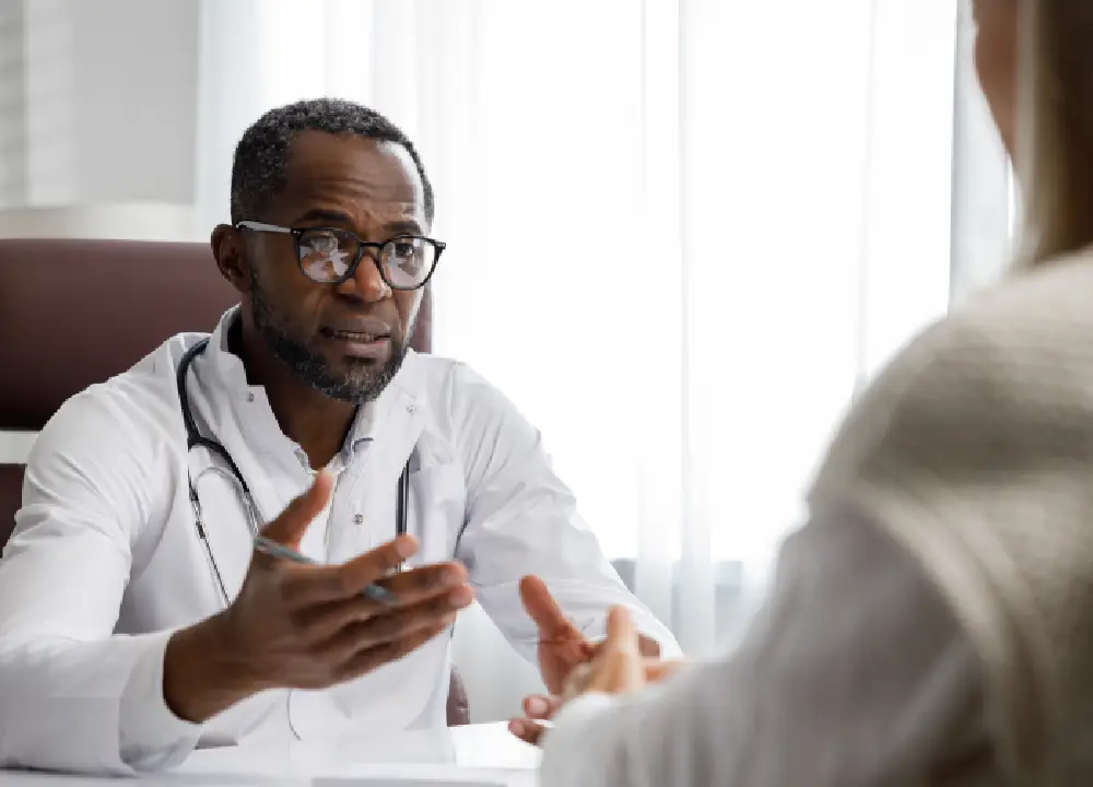 A Complete Guide to Mesothelioma Cancer: From First Symptoms to Legal Rights 1 Doctor consulting with a patient about a medical diagnosis and next steps.