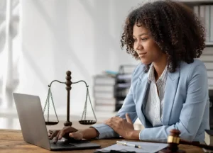 Mesothelioma Claims: The Documentation-First Guide 3 Mesothelioma lawyer reviewing legal documents and case files for an asbestos exposure claim