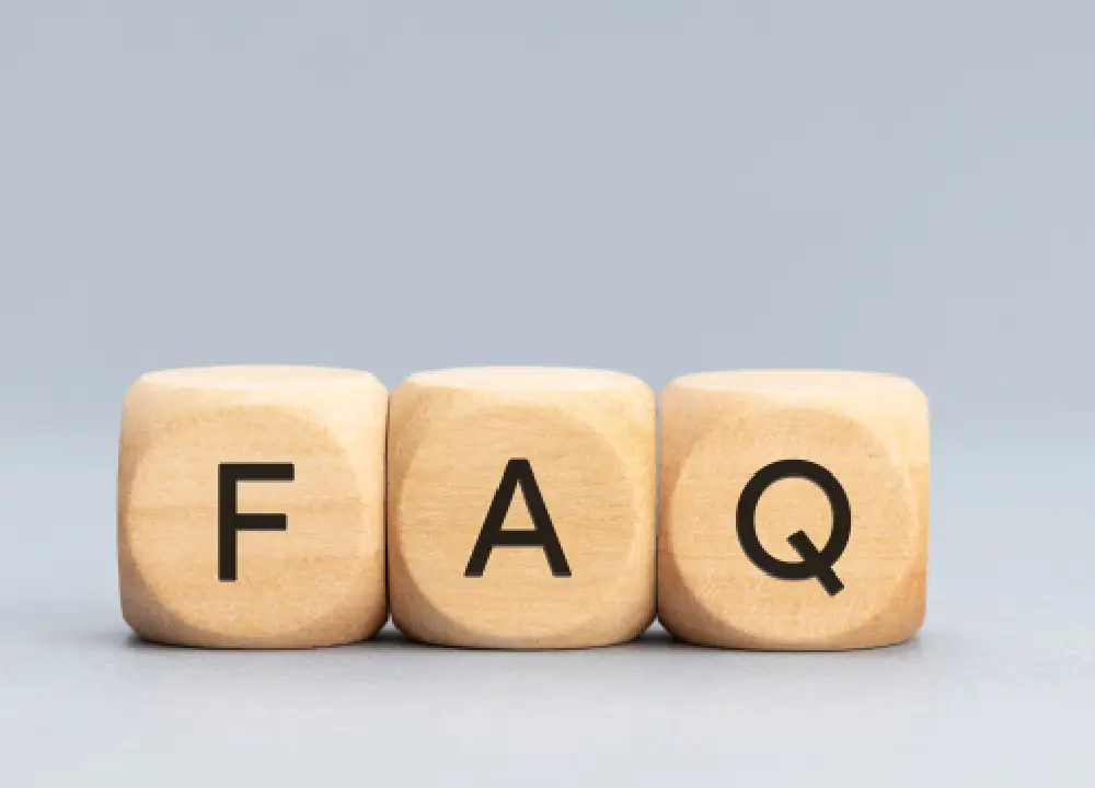 A supportive lawyer explaining legal documents to a senior man during a home visit.