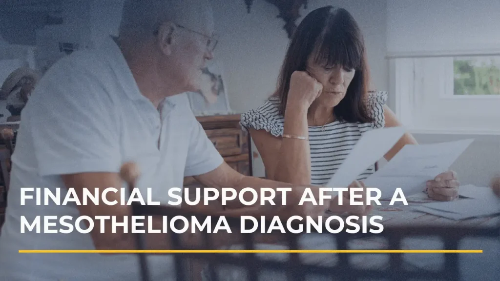 Patient and caregiver reviewing medical bills and paperwork after a mesothelioma diagnosis