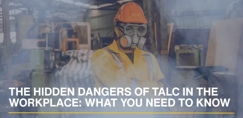 An industrial worker in a factory setting surrounded by airborne talc dust, representing workplace exposure risks.